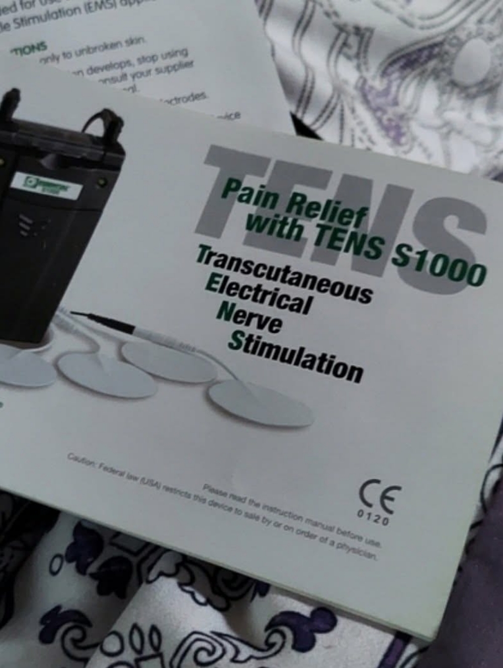 TENS S1000 Pain Relief Device Instruction Manual
